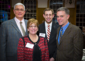 From left, Richard Paynton, Jr. '86, Patricia Paynton-Meier, scholarship recipient Christopher Hoeflinger '17, and John Meier '74