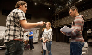 Students and members of the Flux Theater Ensemble work on the Lafayette production of Tartuffe.