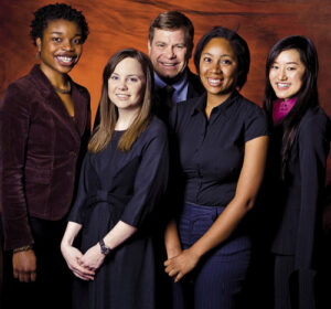 A photo taken in 2008 of Jacqueline Kikuchi '11 (far right) with (L-R) Dora Johnson '08, Emily Simon '11, scholarship donor Peter Simon '75, and Karen Bouldin '08,