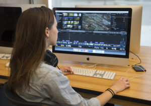 Megan Schmidt '17 edits film on a computer