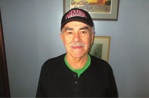 Harlow Waite '57 wearing a Lafayette cap
